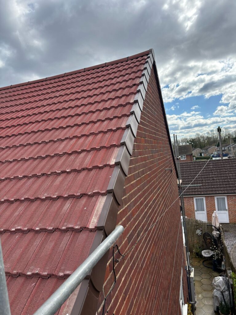 This photo shows a roof in Leicestershire before spray foam removal started.