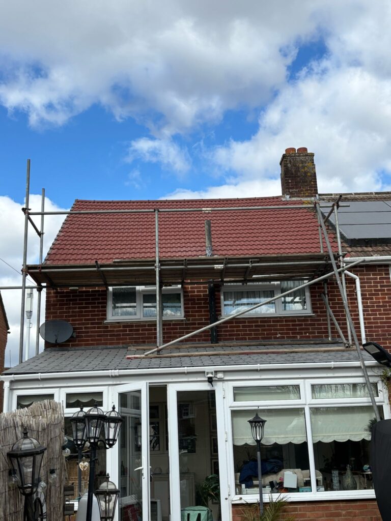 This photo shows a roof in Leicestershire before spray foam removal started.